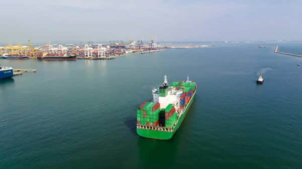 cargo container ship sailing in sea to import export goods and distributing products to dealer and consumers across worldwide, by container ship Transport, commercial port background, aerial view