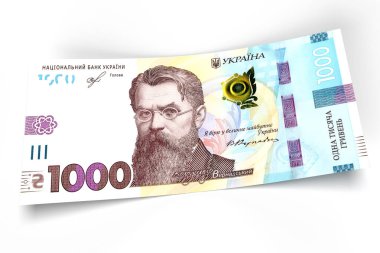 Bin tane Hryvnia banknotu. İzole edilmiş beyaz arkaplandaki Hryvnia banknotunu kapat.