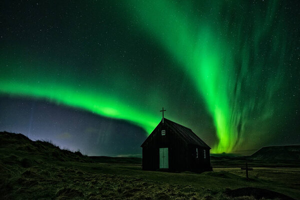 Northern lights in Krysuvikurkirkja in Reykjanes peninsula, Iceland