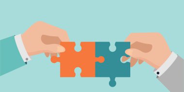 Eller yapbozu birleştirir.