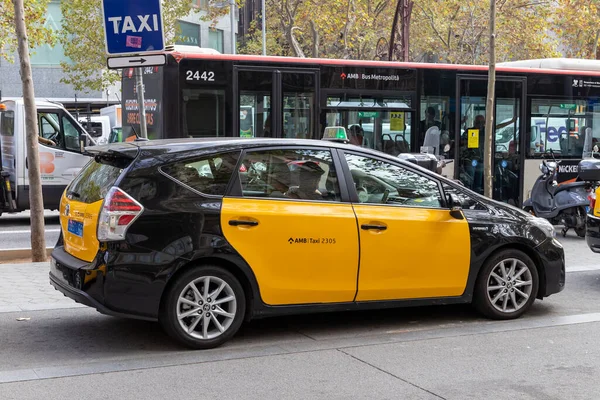 stock image Barcelona, Spain - October 28, 2022, A Barcelona taxi with the classic yellow and black colors, close up