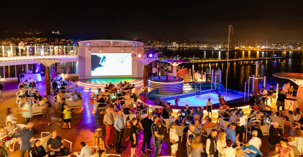 Mallorca, Spain - October 22, 2022, People at dance party during cruise on AIDA COSMA. Dance nights are a typical entertainment on ocean cruises, copy space