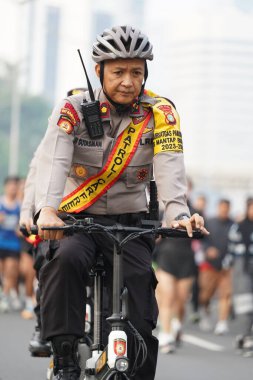 Asyalılar Sudirman-Thamrin bölgesinde koşuyorlar. Arabasız gün Sudirman - Thamrin. Odaklanamadı