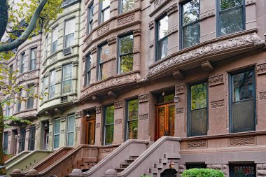 Elegant old New York brownstone townhouses clipart