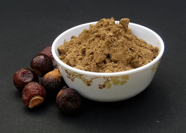 Sapindus mukorossi or Indian soapberry in a bowl 
