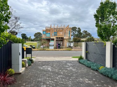 New residential construction home framing against a blue sky. High quality photo
