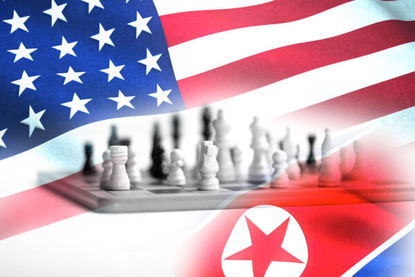 Concept of Bilateral relationship between two countries showing with two flags: United States of America and North Korea. High quality photo