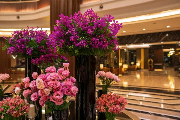 Flowers in the foyer. hotel lobby . High quality photo