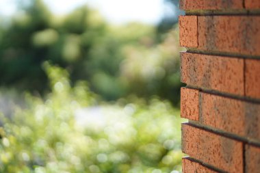 Koyu kahverengi tuğlalar duvar manzarası. Yüksek kalite fotoğraf