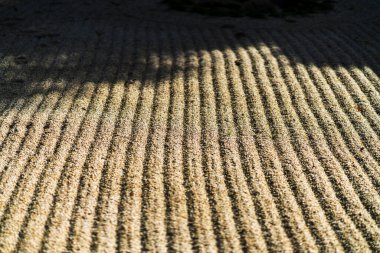 Japonya 'nın Kyoto kentindeki Myoshin-ji Tapınağı' ndaki Taizo-in Tapınağı 'ndaki kuru arazi dalgalanmaları. Yüksek kalite fotoğraf