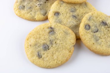Chocolate chip cookies on white background with copy space