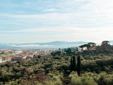 View at Florence from the high viewpoint above the city. Fabulous nature, hills at the horizon and ancient architecture make this city incredibly unique.