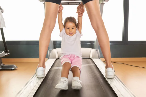 Crop Mother Playing Daughter Treadmill — Stock Photo, Image