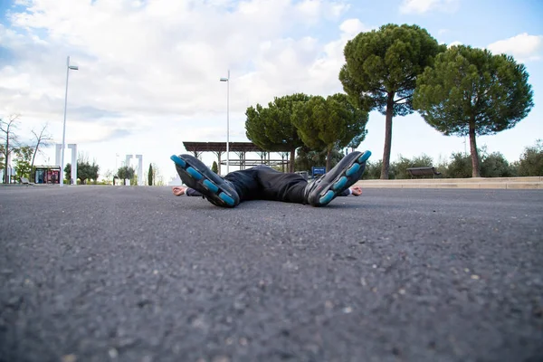 Tired Male Roller Skates Lying Road — Stock Photo, Image