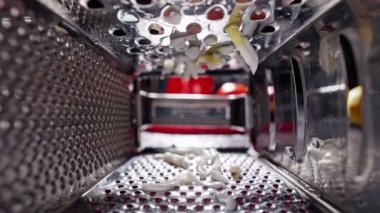 Slow motion video of the chef rubbing eggs in the restaurant kitchen. Preparation of ingredients for cooking by a professional. High quality 4k footage