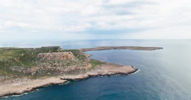 Aerial view coastline landscape with slopes near the sea. Mountains by the ocean. High quality 4k footage