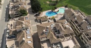 Aerial view luxury villa with pool. Beautiful houses and neighborhoods in the suburbs of the metropolis. Rest and relaxation at home. High quality 4k footage