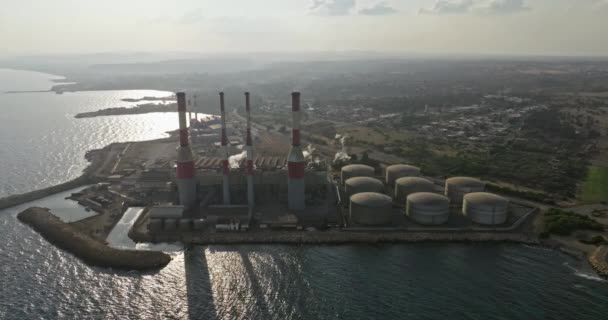 Aerial View Power Plant Produces Electricity Seashore Smoke Pipes Pollutes — Stock Video