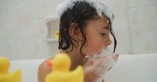 Girl Bathes Foam Bathroom Cheerful Energetic Child Splashes Water Has — Stock Video