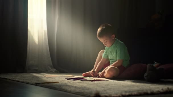 Nurturing Creativity Kids Enchanting Scene Young Boy Immersed Pencil Drawing — Vídeo de Stock