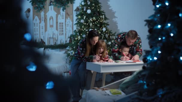 Festive Family Moments Parents Aid Kids Crafting Santa Letters Tree — Stock Video
