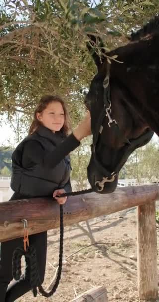 Training Compassion Jockey Girl Demonstrates Love Animals Petting Caring Horse — Vídeo de stock