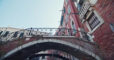 Architecture of buildings in the romantic city of Venice, Italy. Urban landscape of the city with houses built on the water, tourist city of romance. High quality 4k footage