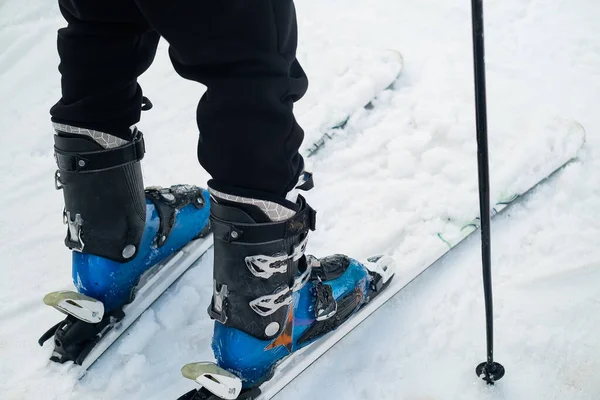 Close Leg Skier Athlete Ski Boots Goes Skis Backdrop Snow — Foto Stock