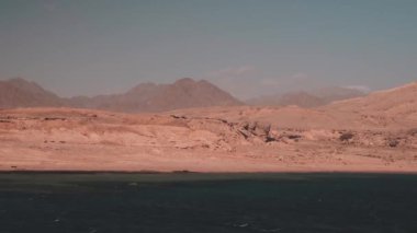 View Of The Red Sea Coast With Desert Rocky Mountains And A Small Town