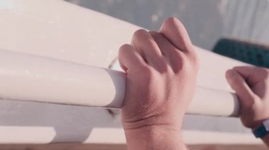 hands close-up on the yacht