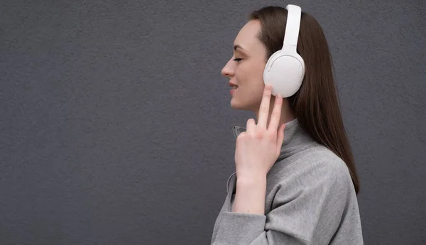 Carefree Attractive Brunette Girl Dressed Gray Sweater Listening Music Headphones — Stock Photo, Image