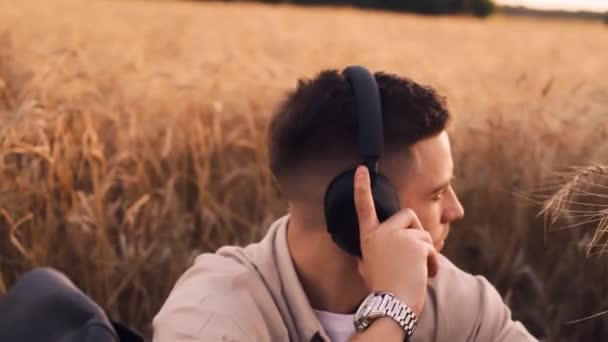 Teenage Guy Headphones Listening Music Lying Grass Happy Summer — Stock Video