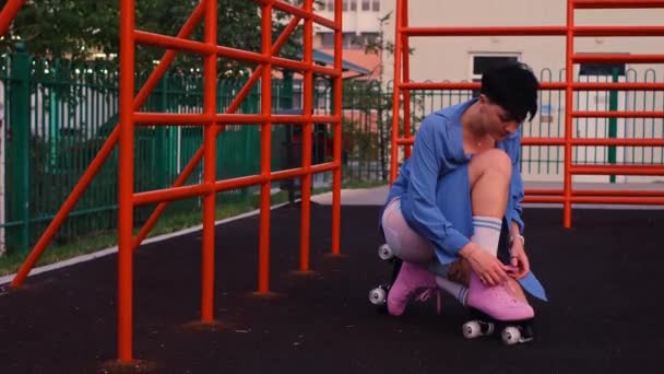 Girl Tying Laces Vintage Roller Skates Close Hands Pink Roller — Stock Video