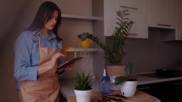 Female Florist Tablet Taking Notes Plants Gardening Concept Digital Plant — Stock Video