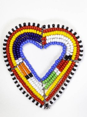 Single colorful beaded heart isolated on white clipart