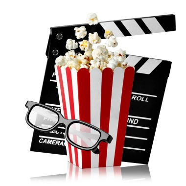 flying popcorn in red and white cardboard striped box with 3d glasses and clapperboard isolated on white background. Watching film in the cinema concept