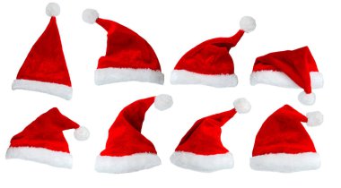 Noel Baba şapkası koleksiyonu ya da beyaz arka planda izole edilmiş kırmızı Noel şapkası. Tatil temasını kavra.