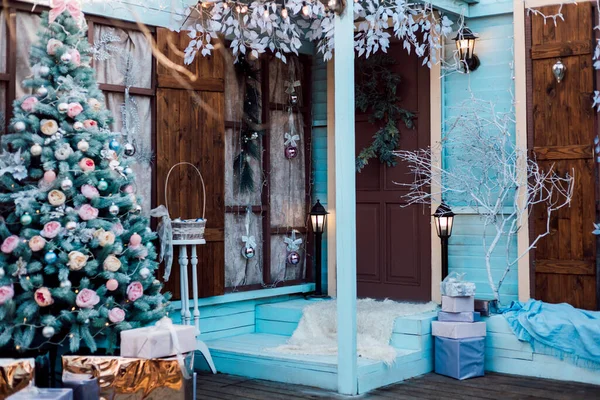 The porch is decorated with Christmas decorations. Loft style. High quality photo