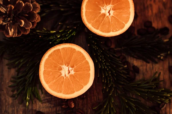 Christmas decorations oranges, cones and Christmas tree. High quality photo