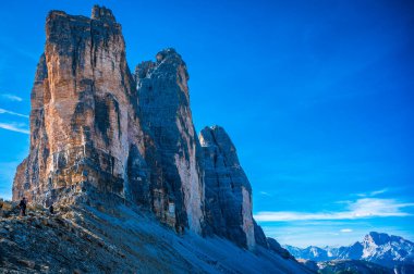 The Tre Cime di Lavaredo also called the Drei Zinnen are three distinctive battlement-like peaks, in the Sexten Dolomites of northeastern Italy.