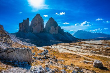 The Tre Cime di Lavaredo also called the Drei Zinnen are three distinctive battlement-like peaks, in the Sexten Dolomites of northeastern Italy.