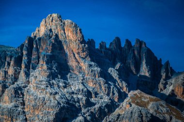 The Tre Cime di Lavaredo also called the Drei Zinnen are three distinctive battlement-like peaks, in the Sexten Dolomites of northeastern Italy.