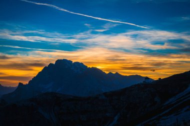 The Tre Cime di Lavaredo also called the Drei Zinnen are three distinctive battlement-like peaks, in the Sexten Dolomites of northeastern Italy.