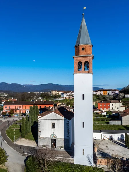 stock image Bell tower of the church of Raspano di Cassacco