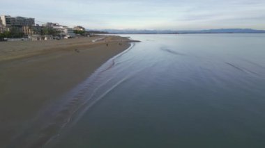 Lignano Sabbiadoro sahilinde gün batımı. 