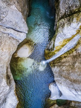 Emerald Water of the Torre Torrent Falls. Silk water. Tarcento, Friuli to discover clipart