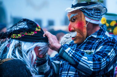 Carnival in Carnia. Sauris, Masks of the religious and pagan tradition. Italy clipart