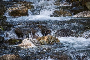 waterfall and Forni Avoltri landscape, Italy