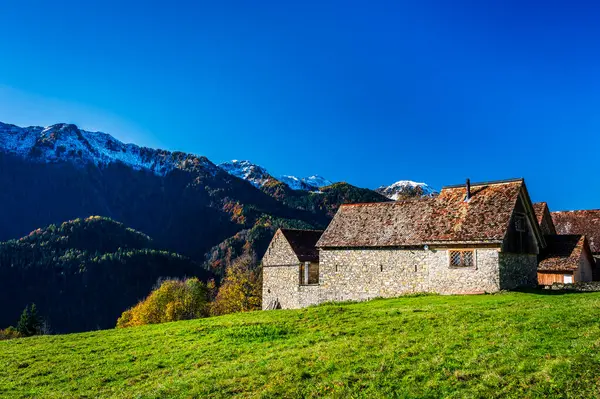 stock image Val Pesarina immersed in autumn atmospheres. Among woods and the ancient Orias stables.