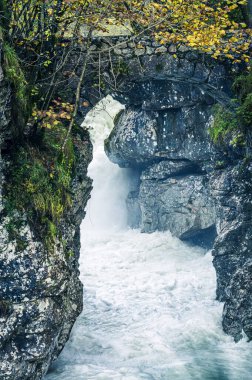 Repepeit waterfall. Small treasure chest in the Val Raccolana. Friuli. Italy clipart